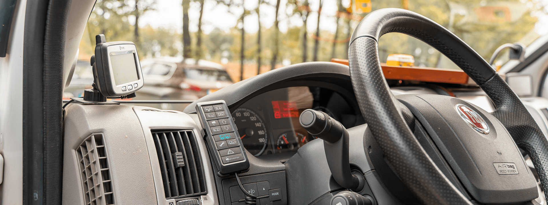 Photo: dashboard and remote control in Bob Pels' motorhome