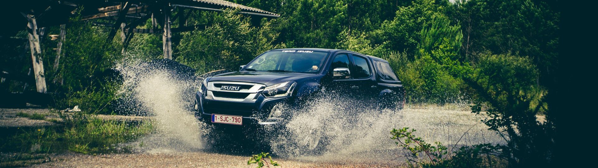 Photo: Isuzu D-Max through the water